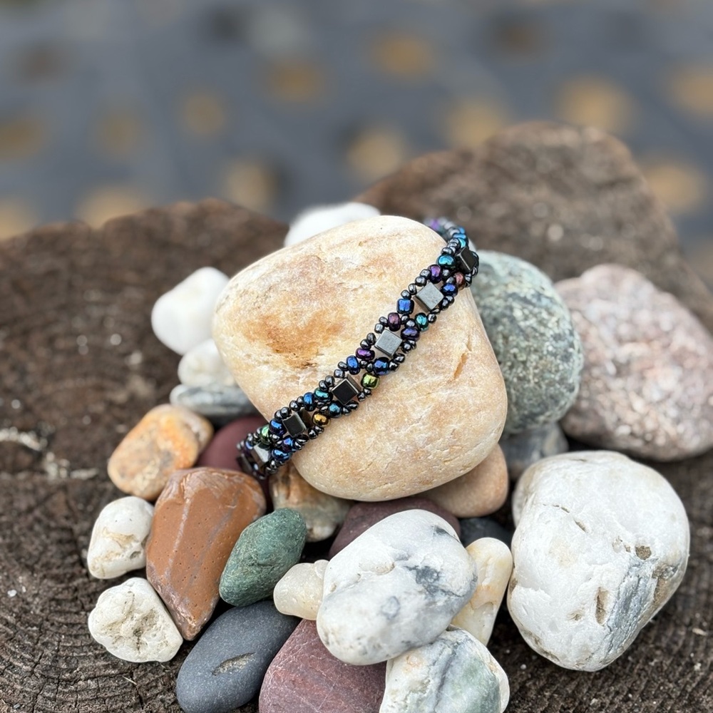 Beaded bracelet with hematite and a barrel clasp. 7”